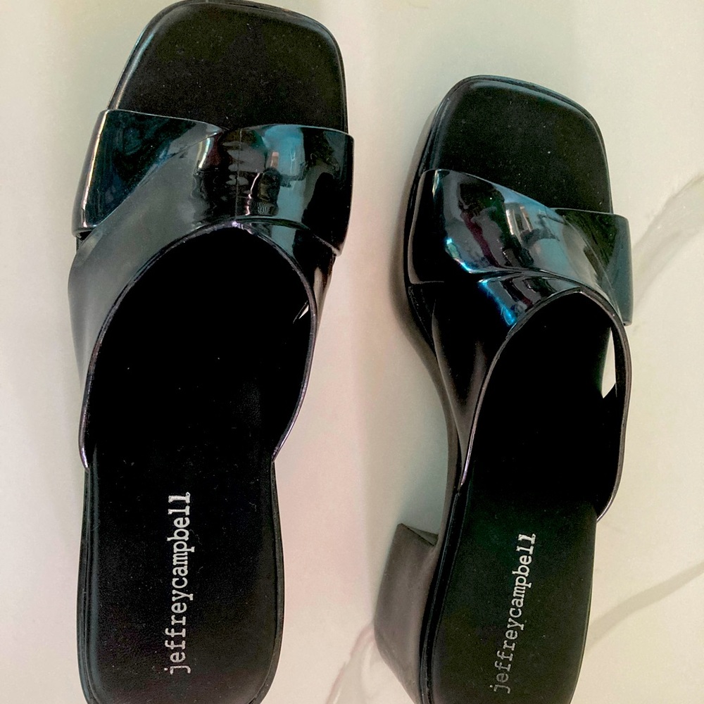 Women Jeffrey Campbell platform bubblegum sandals.